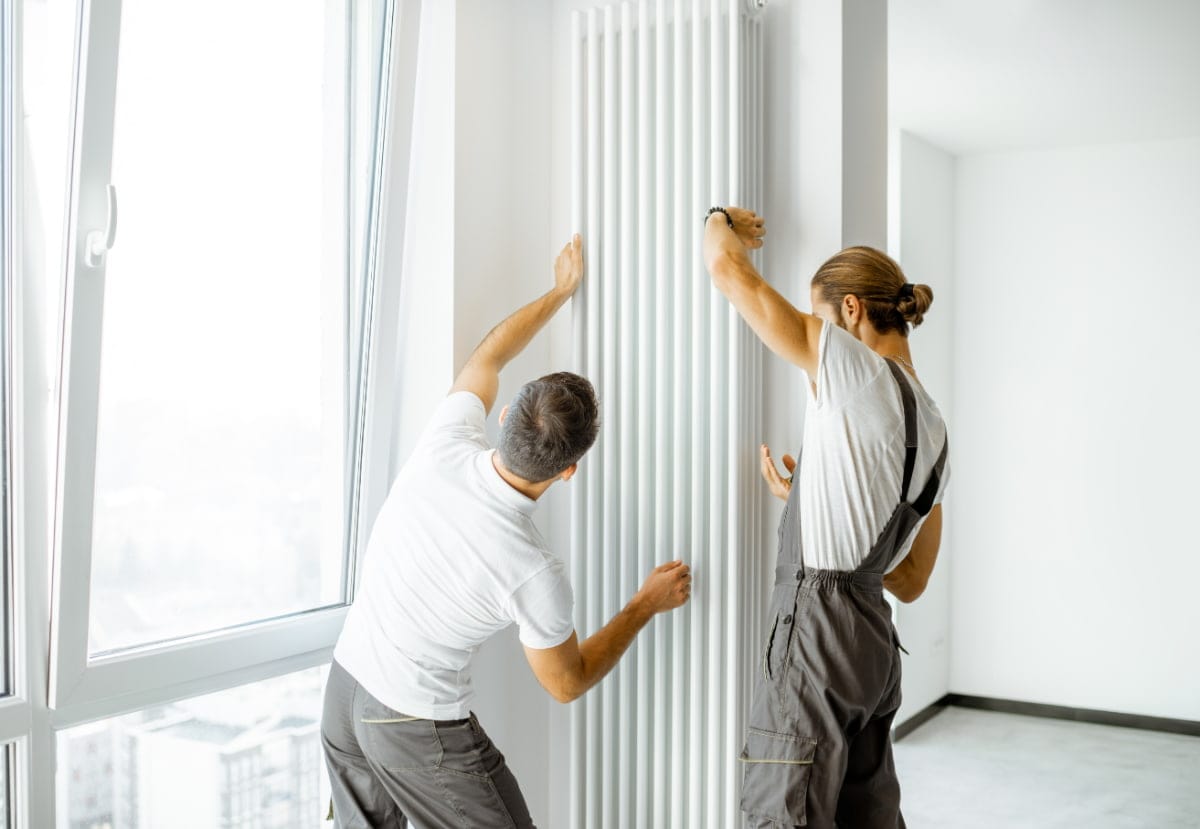 Pose d'un radiateur dans le Béarn